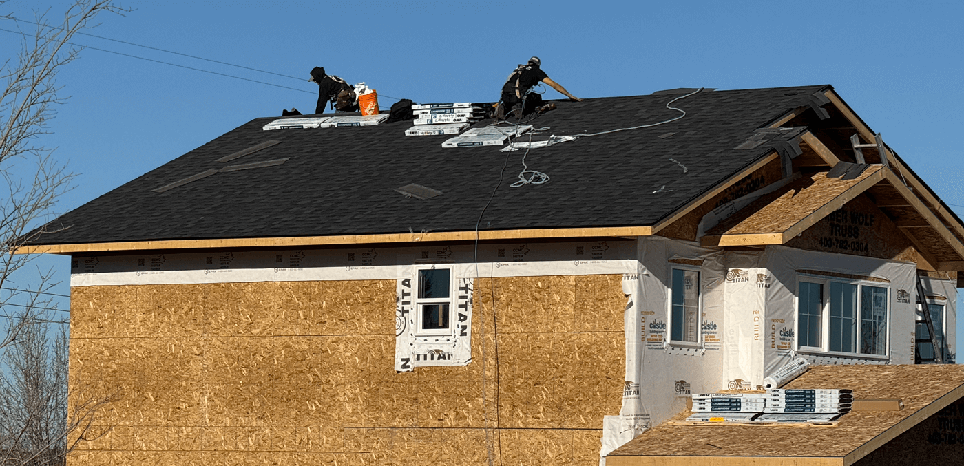 Picture of Roofer Putting Shingles on a Roof